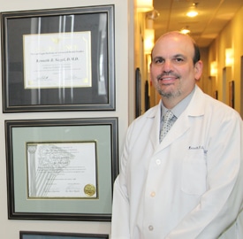 Dr. Siegel with awards for cosmetic dentistry.